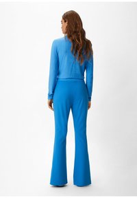 comma casual identity Stoffhose - royalblau