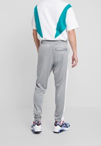 Nike Sportswear Träningsbyxor - dark grey