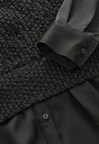 Next Striktrøje - black