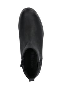 Botín negro de tobillo hecho de cuero suave, con una cremallera lateral, punta redondeada y mínimos detalles de costura en la suela para mayor agarre.