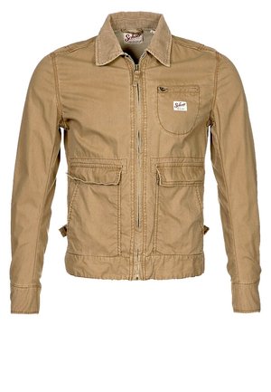 Khaki zip-up jas van katoen met twee voorzakken en een patch pocket op de borst. Voorzien van een kraag en gestikte accenten.