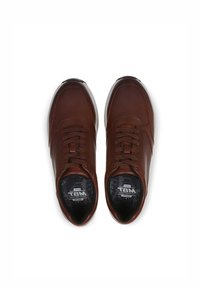 Brown leather sneakers with a mesh design, rounded toe, and flat laces. Features textured accents and a patterned insole.