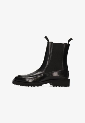 Czarne skórzane botki Chelsea z elastycznymi panelami po bokach, zaokrąglonym noskiem, strukturalną powierzchnią oraz solidną gumową podeszwą. Pętelki do ściągania z tyłu.
