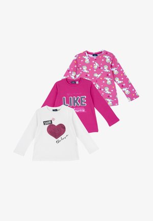 Tre T-shirt a maniche lunghe: una bianca con una grafica di cuore rosso, una rosa con il testo "LIKE" e una decorata con unicorni e stelle.