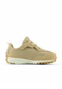 Beige casual sneaker with textured fabric and suede panels, lace-up closure, white midsole, and patterned rubber outsole.