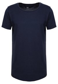 T-shirt in cotone blu navy con collo rotondo, maniche corte e orlo curvo. Presenta un'etichetta piccola all'interno del collo.