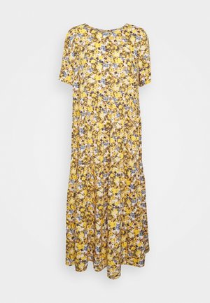 Blommig klänning i gult, blått och brunt. Kort ärm, rund halsringning, lager-på-lager-design, lätt tyg med mjuk textur.