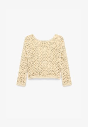 Crochet sweater in light beige, featuring a loose fit, long sleeves, wide neckline, and open stitch pattern throughout the fabric.