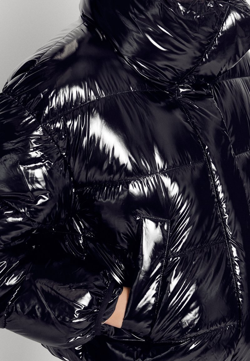 reflective donna karan puffer jacket