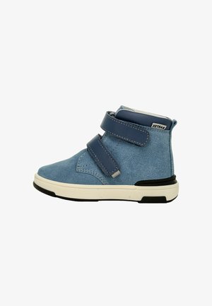 Blue suede ankle boot with two adjustable velcro straps, white sole, and contrasting black rubber outsole. Smooth texture, casual design.