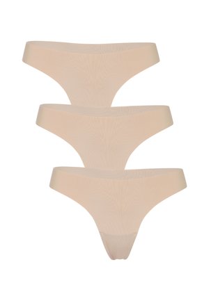 Tre pezzi di biancheria intima beige senza cuciture in stile perizoma impilati verticalmente su uno sfondo bianco.