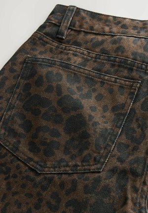 Leopard print denim fabric with a brown and black color scheme, featuring a back pocket and contrast stitching details.