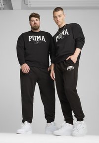Puma SQUAD JOGGING - Trainingsbroek - black