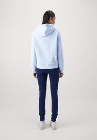 Tommy Jeans TJW BXY BADGE - Sportinis megztinis - breezy blue