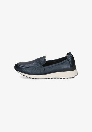 Chaussure slip-on en cuir bleu foncé avec un dessus texturé, présentant un détail de couture surélevé et une semelle en caoutchouc blanche avec un profil de traction texturé.