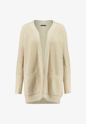 Světlé béžové, žebrované pletené sako s otevřeným předním dílem, dlouhými rukávy a dvěma předními kapsami. Jemná textura s volným střihem.