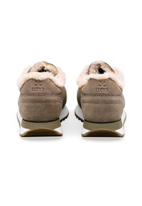 Brown suede athletic shoes with a fluffy collar, white and olive rubber sole, featuring a subtle logo embossed on the back.