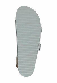 Sko yttersula med ribbad textur, ljusgrå färg och rundad form. Har en lätt kurva vid tåspetsen och fasta kanter.