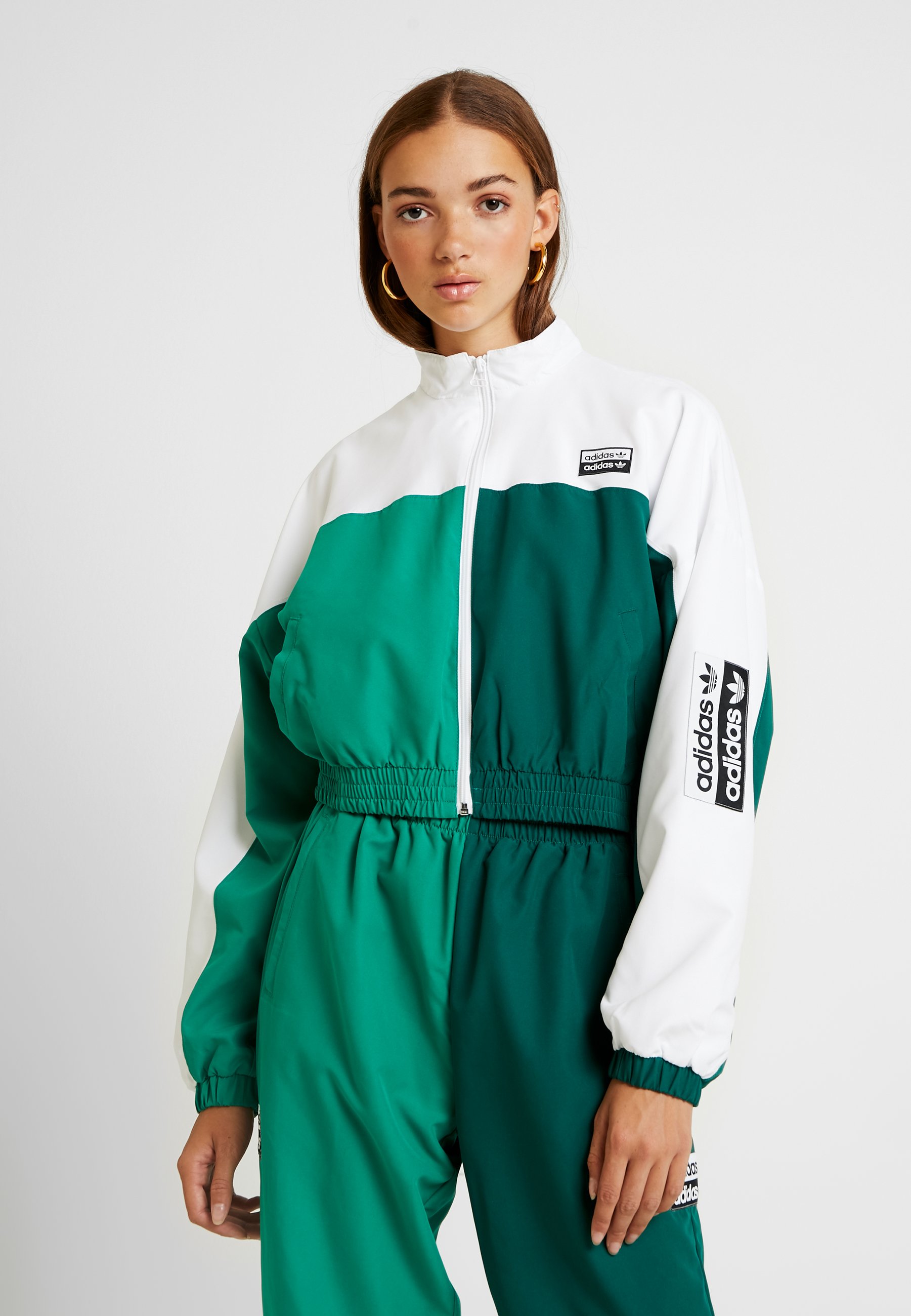 green and white adidas track jacket