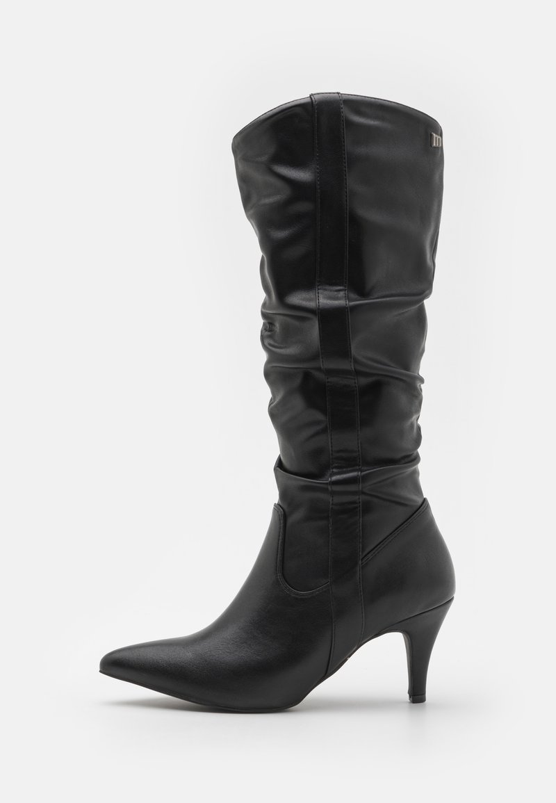 Black knee-high boot made of smooth leather, featuring a pointed toe, slouched design, and a moderate heel.  Accent on the upper side.