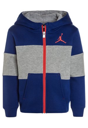 Sweat à capuche zippé pour enfants avec blocs de couleurs bleu et gris, fermeture éclair rouge, poches frontales, capuche et logo Jordan rouge sur la poitrine.