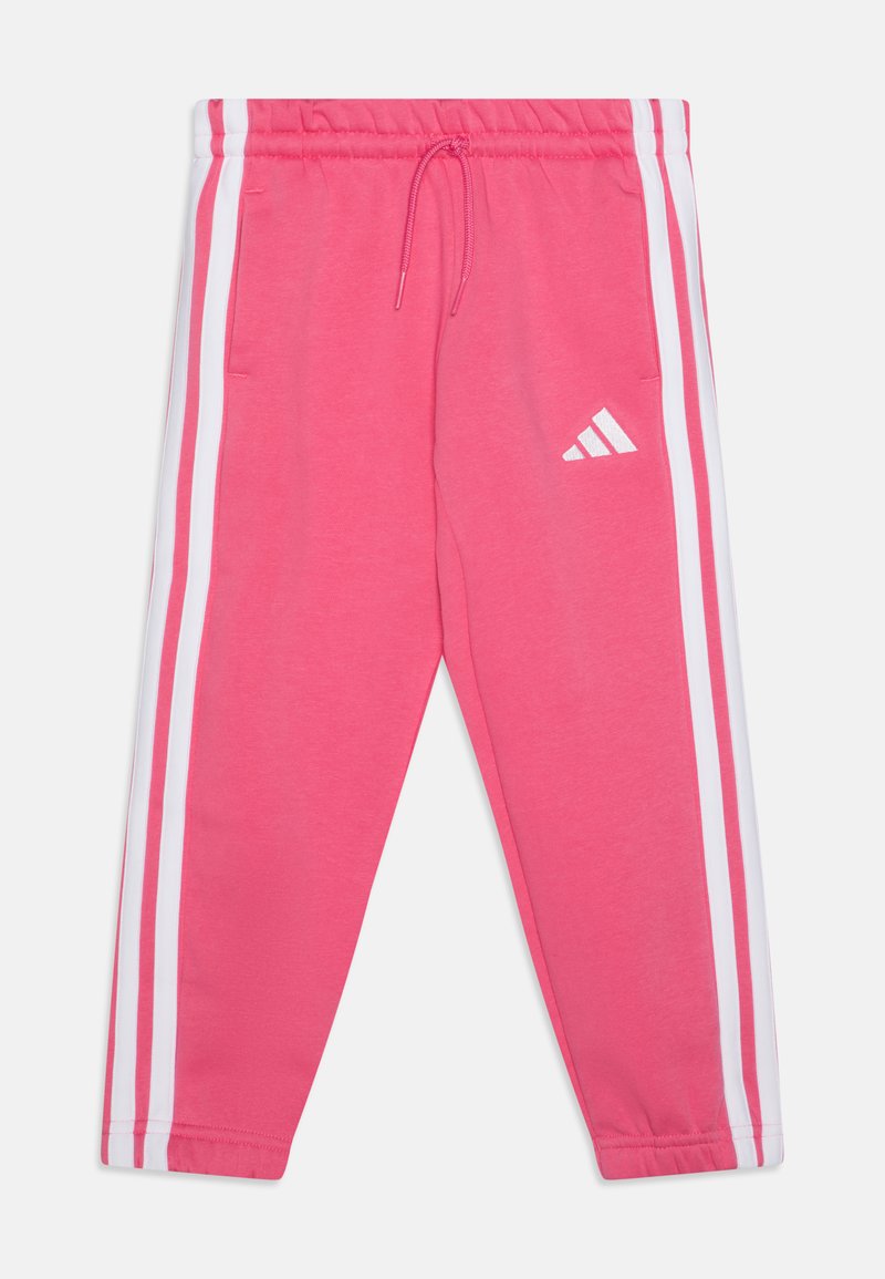 Lyserøde joggingbukser lavet af en bomuldsblanding med hvide sidelister, elastisk talje med snor, og et lille hvidt logo foran.