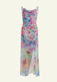 Floral maxi dress in sheer fabric, featuring colorful pink, blue, and green patterns, with thin adjustable straps and a side slit.