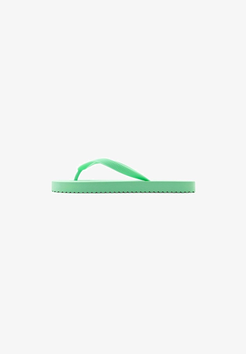 Green rubber flip-flop with a textured strap and scalloped sole. Simple design, lightweight, suitable for casual wear.