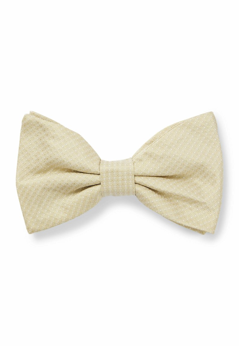 Beige Fliege mit einem strukturierten Muster, das kleine weiße Punkte zeigt. Der Stoff hat ein weiches Aussehen und ist in der Mitte mit einem Knoten verziert.