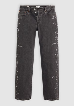 Sorte straight-leg jeans med knappestolpe og sølvstuds dekorasjoner i et virvlende mønster langs de ytre sømmene.
