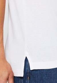 Tommy Jeans Polotričko - white