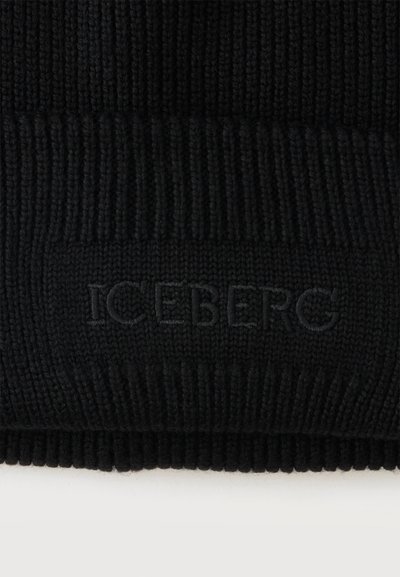 Tissu en maille noir avec une texture côtelée présentant le mot en relief "ICEBERG" en fil noir assorti.