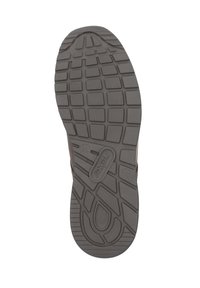 Suela de zapato con una superficie texturizada y patrón en goma gris; cuenta con ranuras para tracción y un detalle de logo en relieve.