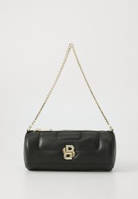 Black leather handbag with a cylindrical shape, featuring a gold chain strap and a prominent gold logo accent on the front.
