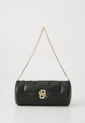 Black leather handbag with a cylindrical shape, featuring a gold chain strap and a prominent gold logo accent on the front.