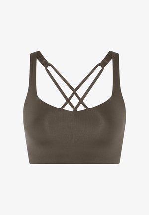 Sømløs mørkebrun sports-BH med brede skulderstropper og doble kryssede stropper bak for ekstra støtte.