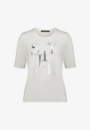 Biała koszulka z krótkim rękawem i okrągłym dekoltem, z metalicznym srebrnym napisem "STYLE" i kropkami na przodzie. Miękka tkanina.