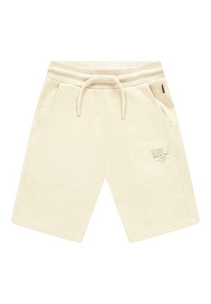 Beige katoenen shorts met elastische tailleband, trekkoord, zijzakken en kleine bedrukte tekst op de linker dij.