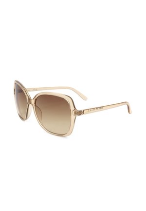 Occhiali da sole quadrati oversize beige con lenti marroni sfumate e sottili aste beige abbinate.