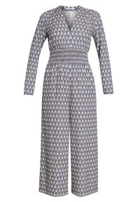 Mono de manga larga en azul marino con estampado floral blanco, que presenta un escote en V profundo y cintura fruncida, con piernas anchas y sueltas.