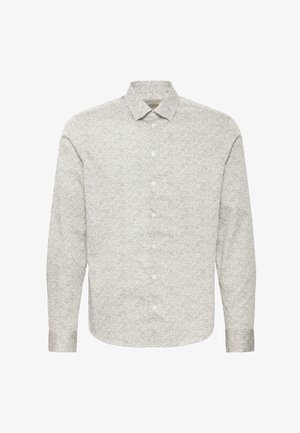 Long-sleeve shirt in light beige fabric with small, dark floral pattern. Features a collared neckline and button-front closure.