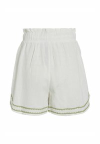 Shorts en lin blanc avec une taille froncée, présentant des broderies vertes en forme de coquille le long de l'ourlet. Tissu léger et texturé.
