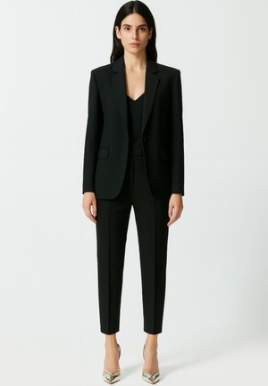 TRIDENTE  - Pantalon classique - nero limousine