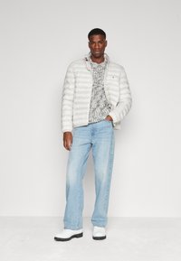 Tommy Hilfiger PACKABLE - Jachetă subțire - misty coast