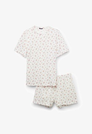 Weißes Kurzarmhemd und Shorts mit kleinem rosa-grünem Blumenmuster, entworfen für Freizeit- oder Schlafbekleidung.