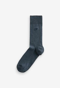 Dunkelgraue Socke mit gerippter Bünne, glatter Textur und subtilen Logodetails. Das Design weist eine klassische Form für angenehmen Tragekomfort auf.