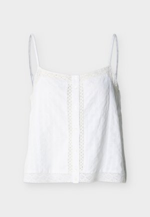 Witte mouwloze cami met dunne bandjes, knoopsluiting aan de voorkant en kanten biezen langs de randen en zoom.