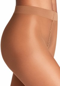 Beige Strumpfhosen mit einer glatten, glänzenden Textur. Verfügen über einen breiten, elastischen Bund und ein nahtloses Design, das die Beinform betont.