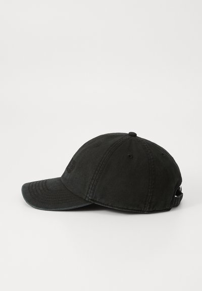 Black cotton baseball cap with a structured brim, adjustable strap at the back, and subtle logo detailing. Smooth texture, round crown.