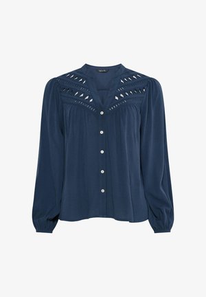 Laivastonsininen pitkähihainen pusero, jossa on V-kaula-aukko, napillinen edusta, kerätyt hihansuut ja yläosan rintakehän sekä hartioiden laserleikatut geometriset yksityiskohdat.